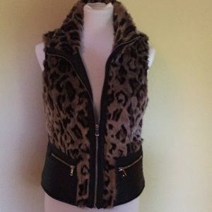 Faux fur and leather vest